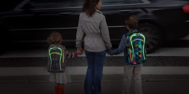 Kinder im Dunkeln sichtbar machen – mit Reflektoren für den Schulweg