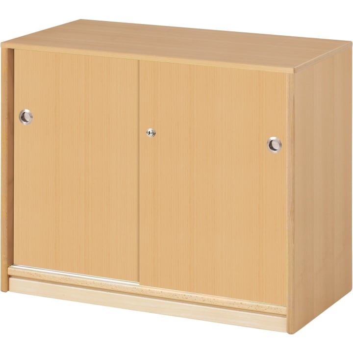 Ein heller Holzschrank mit zwei Schiebetüren und runden Metallgriffen. Der Schrank ist rechteckig und hat ein einfaches, minimalistisches Design.