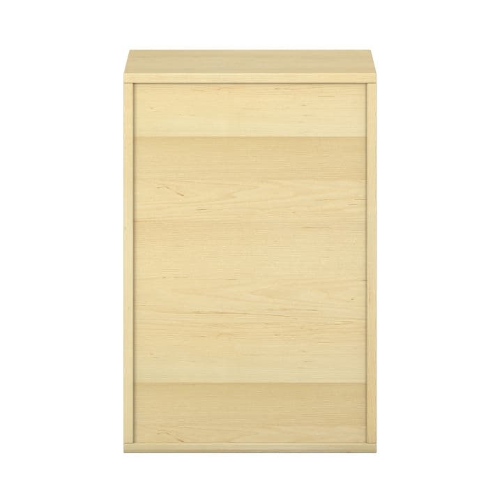 Ein rechteckiger Schrank oder eine Aufbewahrungseinheit aus hellem Holz mit geschlossener Front, glatter Oberfläche und minimalen Details, fotografiert vor einem weißen Hintergrund.