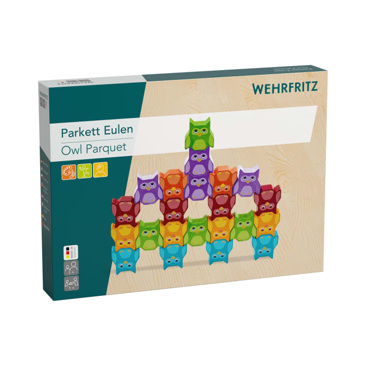 Eine Schachtel mit der Aufschrift HABA Pro Parkett Eulen-Parkett, auf deren Vorderseite bunte, stapelbare Eulen-Bausteine in Pyramidenform abgebildet sind.