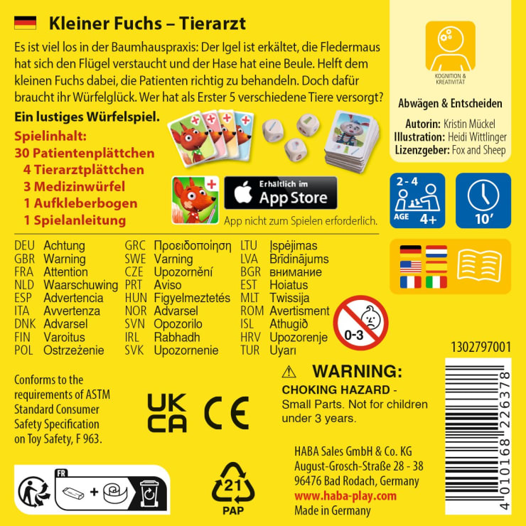 Die Rückseite einer Brettspielschachtel für Kinder mit dem Titel Kleiner Fuchs - Tierarzt, mit bunten Symbolen, Anleitungstext in mehreren Sprachen, Sicherheitswarnungen und einer Abbildung von Spielsteinen und einer App-Werbung.