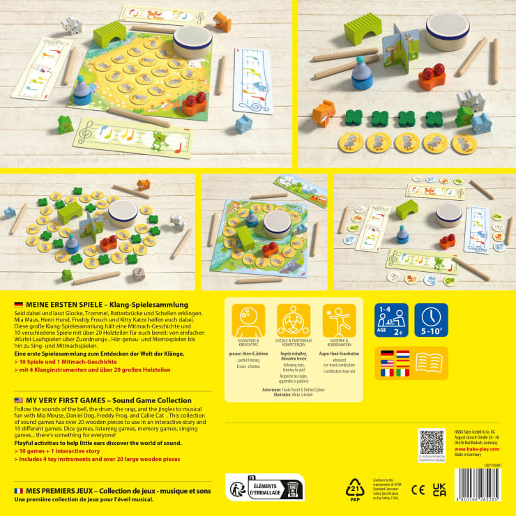 Ausgestellt ist ein Brettspielset mit verschiedenen Komponenten, darunter Holzplättchen, Tierfiguren, ein Schläger, ein Spielbrett mit Bildern, Anleitungsblätter und illustrierte Spielsteine. Die Anleitungen in mehreren Sprachen sind unter den Fotos abgebildet.