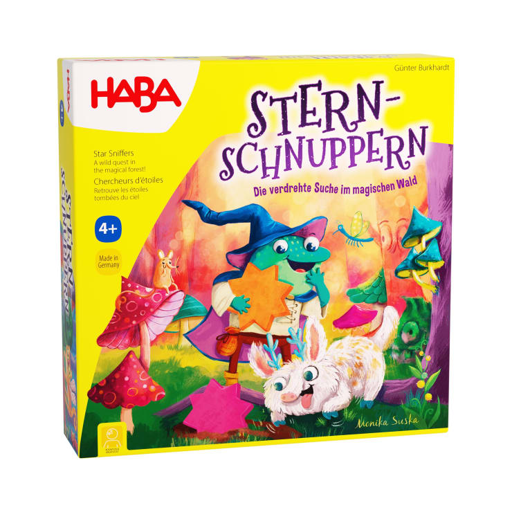 Eine farbenfrohe Brettspielschachtel mit dem Titel Stern-Schnuppern von HABA, die illustrierte Tiere, darunter einen grünen Drachen und einen weißen Hasen, zeigt, die Sterne in einer lebhaften Waldszene halten; gekennzeichnet für Kinder ab 4 Jahren.