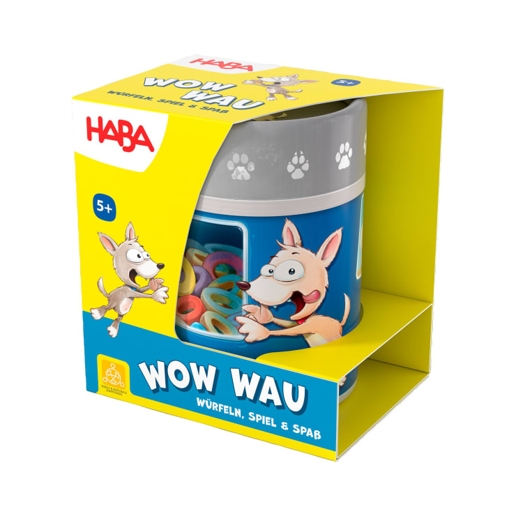 Ein verpacktes HABA-Spiel namens Wow Wau für Kinder ab 5 Jahren. Die Verpackung ist gelb und blau mit Hundeillustrationen, Pfotenabdrücken und bunten Spielsteinen, die durch ein durchsichtiges Fenster sichtbar sind.