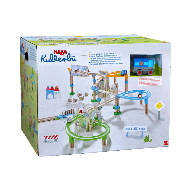 Eine Schachtel des HABA-Kullerbü-Spielsets mit einer bunten Murmelbahn mit Holz- und Kunststoffbahnen, verschiedenen Bauteilen und einem blauen Fahrzeug, abgebildet mit Bildern und Informationen auf der Verpackung.