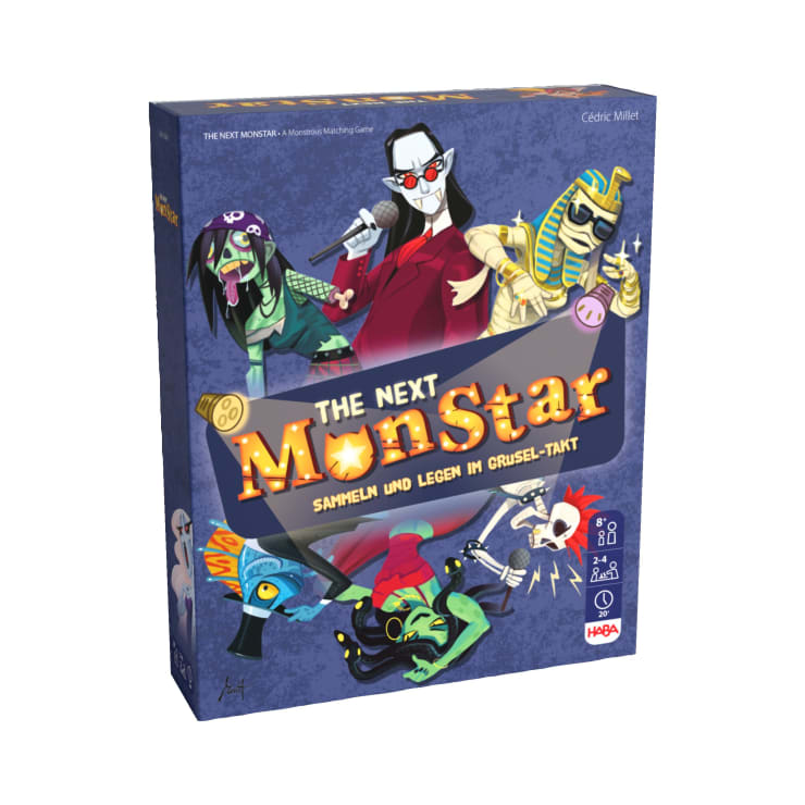 Schachtel des Brettspiels The Next Monstar mit Cartoon-Monstern, darunter ein Vampir, eine Mumie, ein Skelett und eine Hexe, auf dunkelblauem Hintergrund. Auf der Vorderseite sind deutscher Text und Spielsymbole abgebildet.