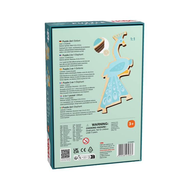 Die Rückseite einer Puzzlebox zeigt ein Bild eines fertigen Puzzles in Elefantenform, Produktinformationen in mehreren Sprachen, Sicherheitshinweise, eine Altersempfehlung ab 3 Jahren, Strichcodes und verschiedene Zertifizierungssymbole.