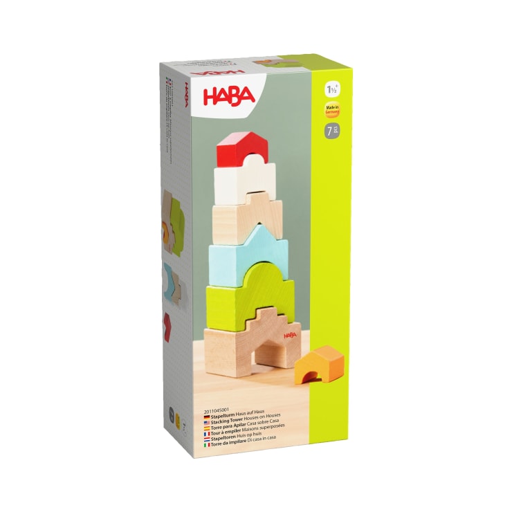Eine rechteckige Schachtel mit HABA-Stapelblöcken aus Holz. Die Vorderseite zeigt sieben bunte geometrische Blöcke, die auf einem Tisch gestapelt sind. Die Schachtel enthält Produktinformationen und ist für Kinder ab 1,5 Jahren geeignet.