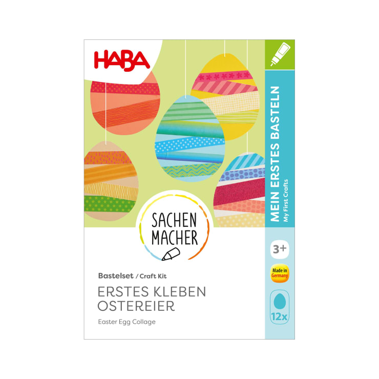 Eine HABA-Bastelpackung mit dem Titel Erstes Kleben Ostereier mit bunt verzierten Ostereiern auf der Vorderseite. Auf der Schachtel steht, dass sie für Kinder ab 3 Jahren geeignet ist und 12 Teile enthält. Der Text ist in Deutsch und Englisch.