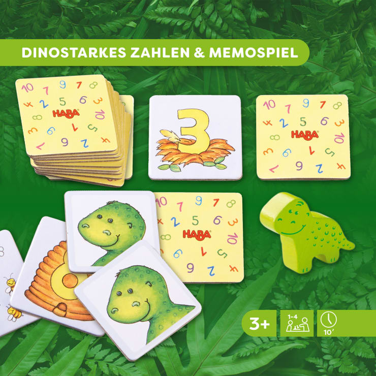 Gezeigt wird ein Brettspielset "Dinostarkes Zahlen & Memospiel" von HABA. Es enthält illustrierte Karten mit Zahlen, Dinosauriern und Gegenständen sowie eine kleine grüne Dinosaurierfigur. Für Kinder ab 3 Jahren.