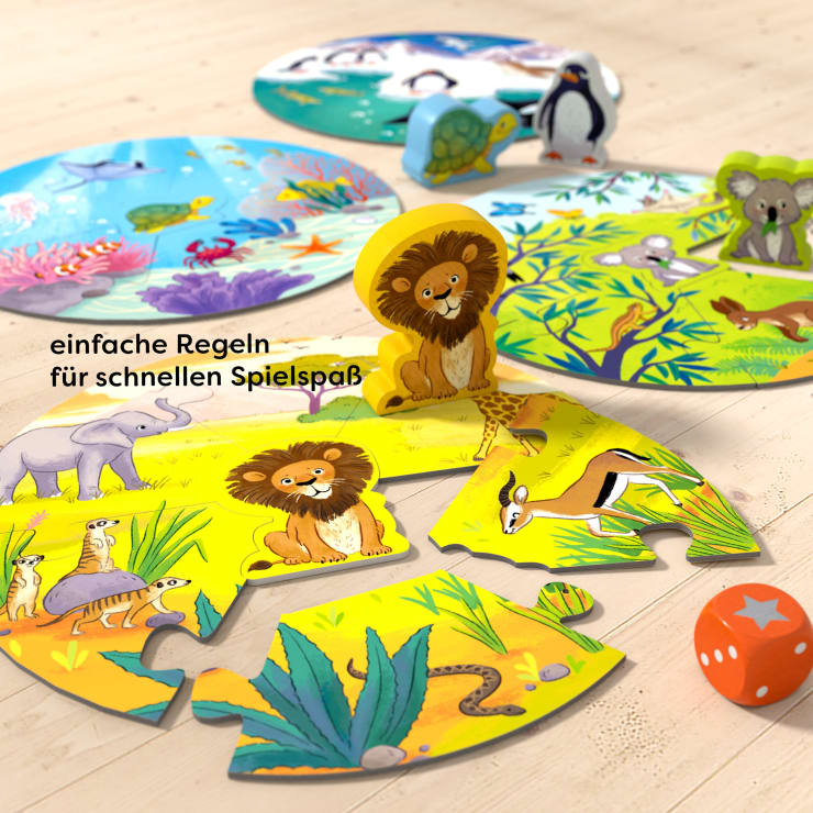Farbenfrohes Brettspiel für Kinder mit tierischen Puzzlestücken, darunter ein zentrales Löwenteil. Andere Tierbretter und -teile zeigen Meeresbewohner und arktische Tiere. Ein roter Würfel und ein deutscher Text sind ebenfalls zu sehen.
