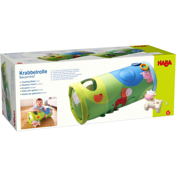 Rechteckige Schachtel mit einem farbenfrohen Krabbelspielzeug mit Abbildungen von Bauernhoftieren und einer kleinen Plüschkuh. Die Marke HABA und mehrsprachige Beschreibungen sind auf der Verpackung sichtbar.
