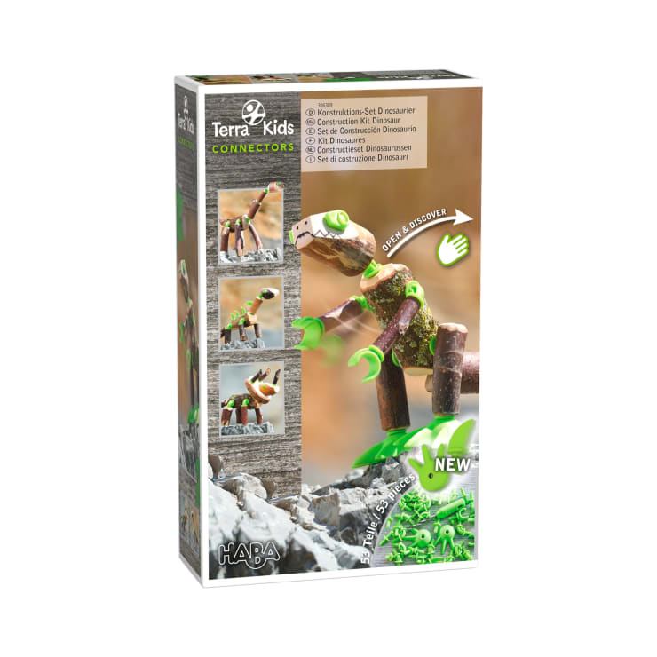Abgebildet ist eine Schachtel des HABA Terra Kids Connectors Dinosaurier-Bausatzes. Die Verpackung zeigt eine gebaute Dinosaurierfigur, Schritt-für-Schritt-Bilder auf der linken Seite und Produktinformationen in mehreren Sprachen auf der Vorderseite.