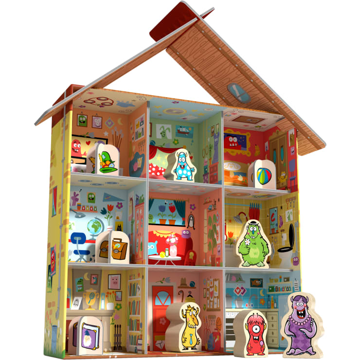 Ein buntes Puppenhaus aus Holz mit neun Zimmern, die jeweils mit Möbeln und Mustern dekoriert sind. Mehrere Cartoon-Monsterfiguren sind in den Zimmern und vor dem Haus aufgestellt. Das Dach ist schräg geöffnet.