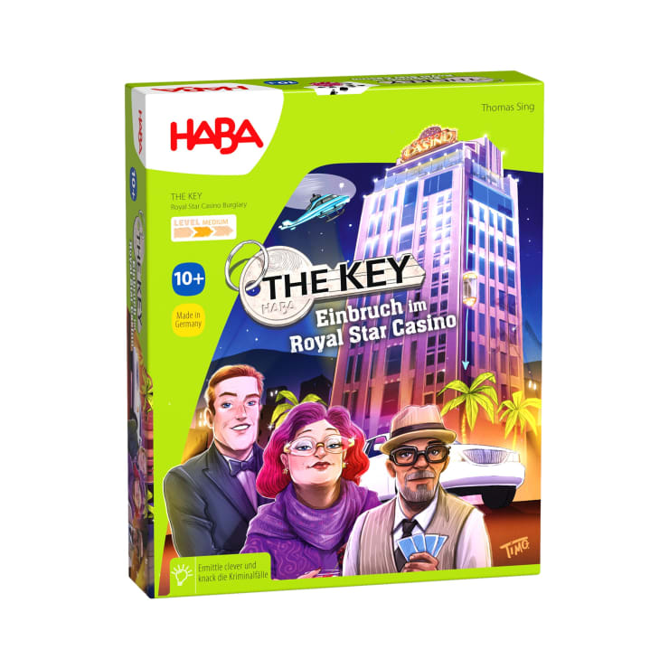 Eine bunte Brettspielschachtel mit dem Titel The Key: Einbruch im Royal Star Casino von HABA, mit einem Casino-Gebäude, drei illustrierten Figuren und einem Detektiv-Thema. Geeignet für Kinder ab 10 Jahren.