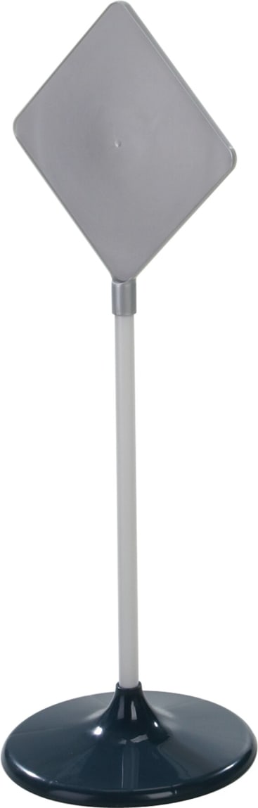Ein freistehendes Zeichen mit einer leeren, rautenförmigen grauen Fläche, das auf einem Mast mit einem runden, dunklen Sockel montiert ist.