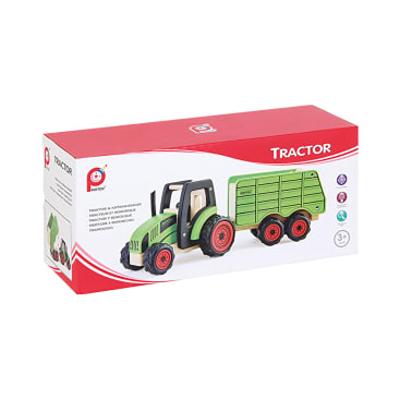 Eine rechteckige Schachtel mit einem Spielzeugtraktor und einem grünen Anhänger. Die Schachtel ist überwiegend weiß und rot mit Produktbildern, dem Wort TRACTOR und einer Altersempfehlung ab 3 Jahren.