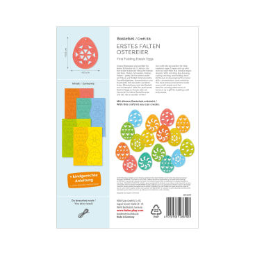 Auf der Rückseite einer Bastelpackung mit der Aufschrift First Folding Easter Eggs (Erste Ostereier falten) befinden sich Anleitungen, Sicherheitshinweise und Bilder der enthaltenen farbigen Papierbögen mit Ostereiermotiven. Die Beschreibung ist auf Deutsch und Englisch.