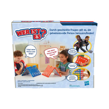 Zwei Kinder sitzen an einem Tisch und spielen die deutsche Version des Brettspiels Guess Who? Die Spielbretter und Karten sind sichtbar. Der Text in deutscher Sprache enthält Anweisungen und Beispielfragen.