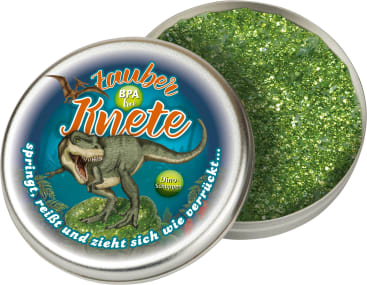 Eine runde Dose mit der Aufschrift "Zauber Knete" und einer Dinosaurier-Illustration, die sich öffnen lässt, um grüne Glitzerknete im Inneren zu enthüllen. Der Text auf dem Deckel enthält auch BPA frei, Dino-Schuppen und andere deutsche Phrasen.